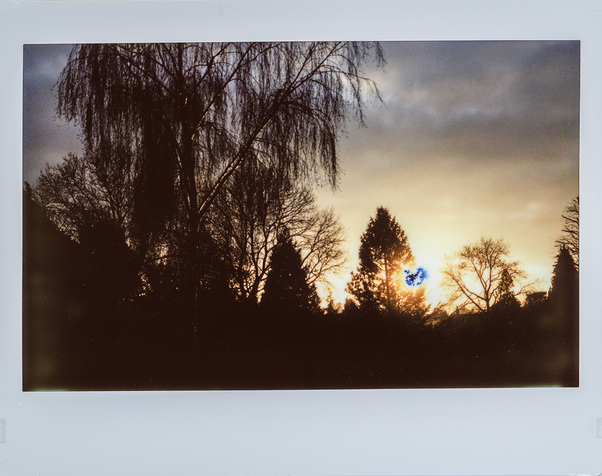 Sunset through the window [Custom Polaroid 110A Instax Wide Conversion - Instax Wide Colour]