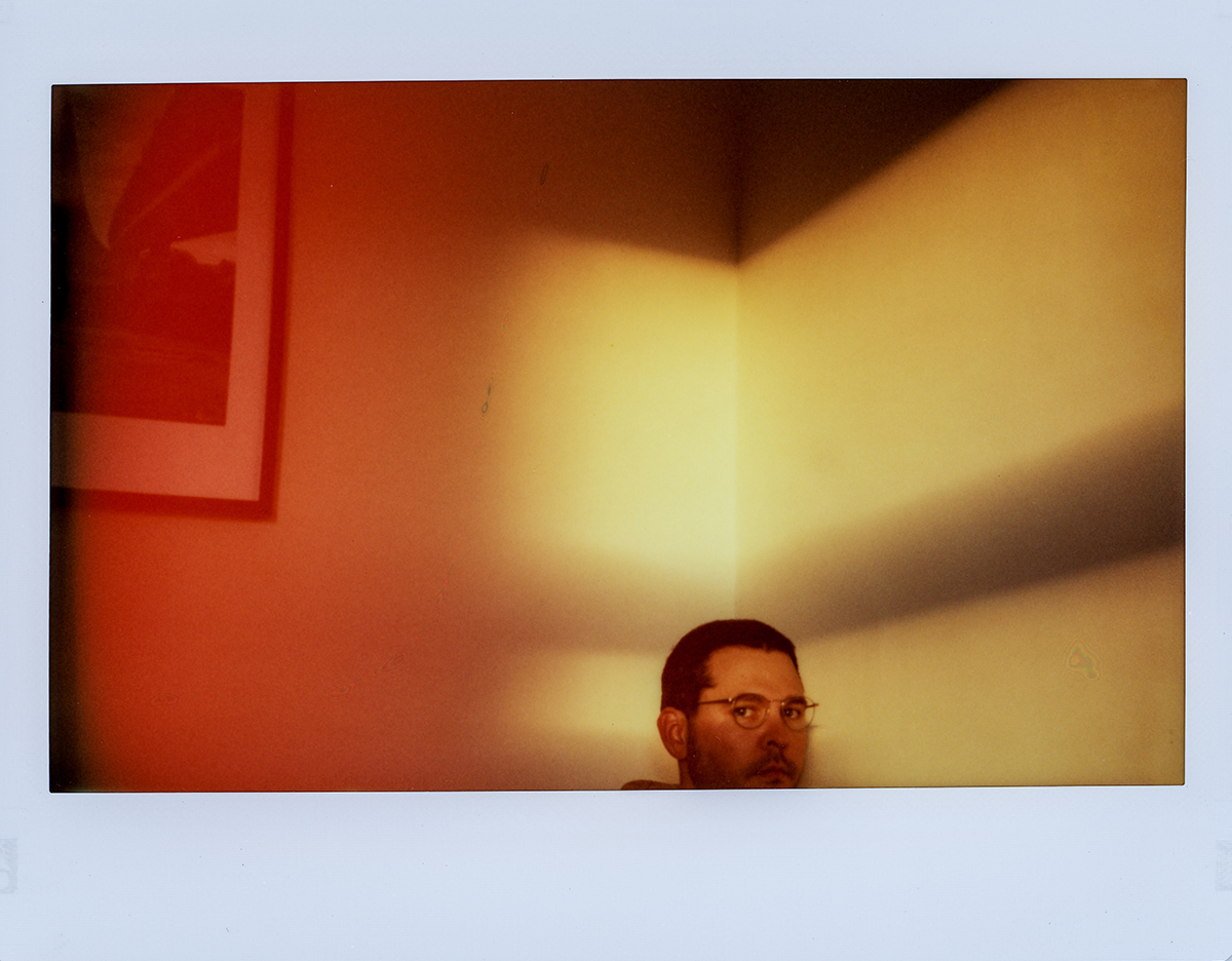 Badly framed, beautiful light (self-portrait) [Custom Polaroid 110A Instax Wide Conversion - Instax Wide Colour]