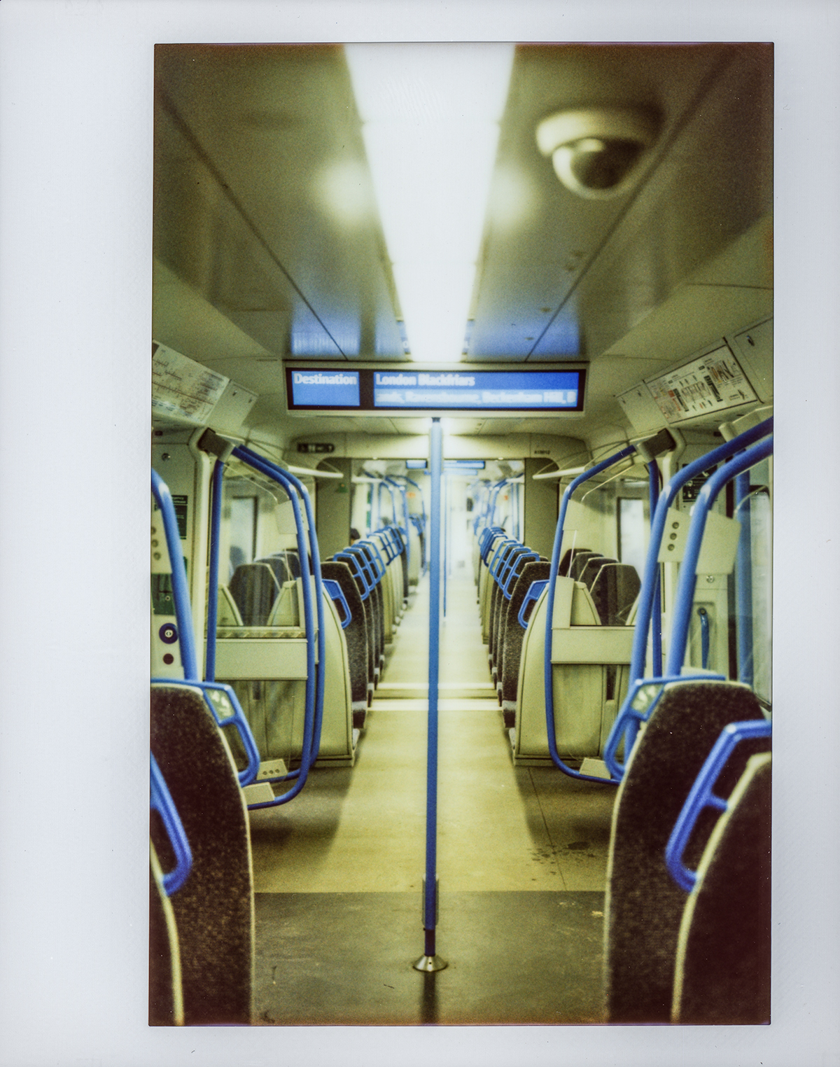A train all to ourselves [Custom Polaroid 110B Instax Wide Conversion - Instax Wide Colour]